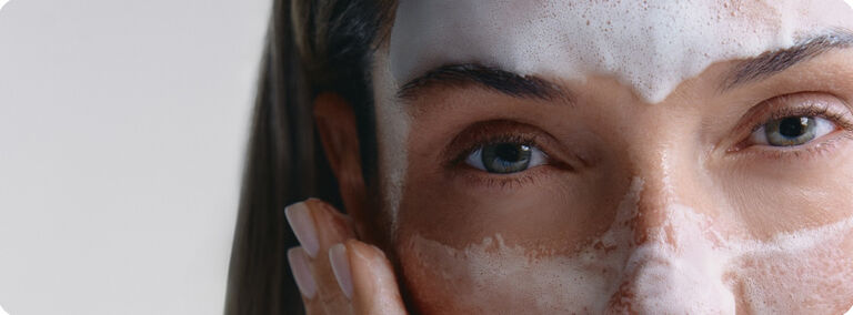 Woman with a white foam mask