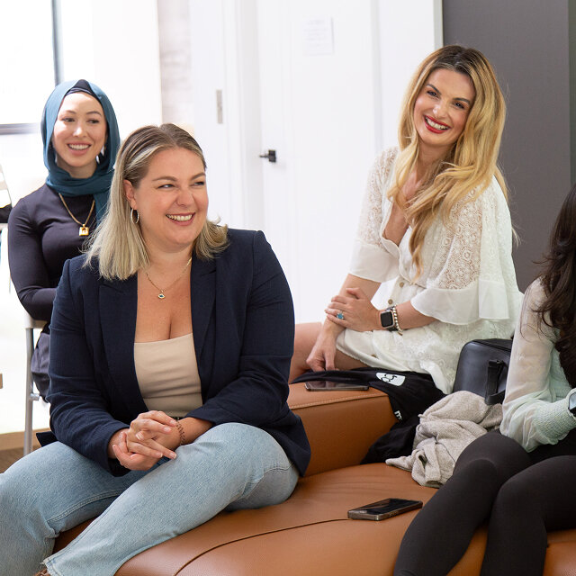 Clinic partners gathering in a modern lounge